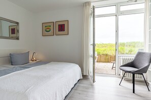 2 dormitorios, cuna de viaje, wifi gratis y ropa de cama