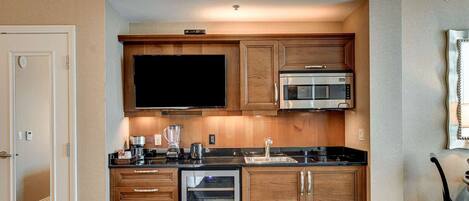 Fridge, microwave, stovetop, coffee/tea maker