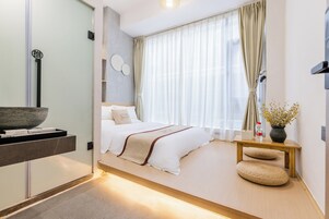 Doppia Superior, futon giapponese, non fumatori, vista città | Tende oscuranti, insonorizzazione, Wi-Fi gratuito, lenzuola