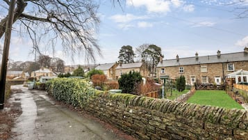 Stroll through a quiet suburban neighborhood lined with charming houses.