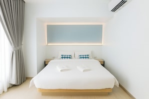 Deluxe tweepersoonskamer | Een bureau, gratis wifi, beddengoed