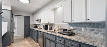 Spacious Modern Retreat Near Plaza District | Laundry Room & Pool Table #08