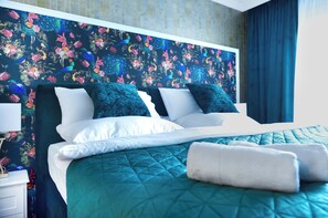 1 habitación, tabla de planchar con plancha, cuna de viaje y wifi