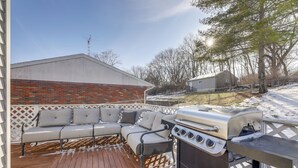 An outdoor deck with a barbecue grill and a sectional sofa. - 3 Mi to Englewood Dam: Pet-friendly Home w/ Yard! (Englewood)