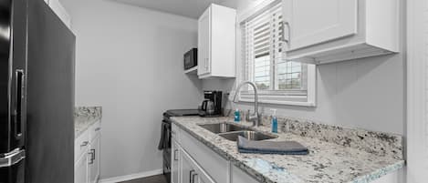 Condo, 2 Bedrooms | Private kitchen | Fridge, coffee/tea maker