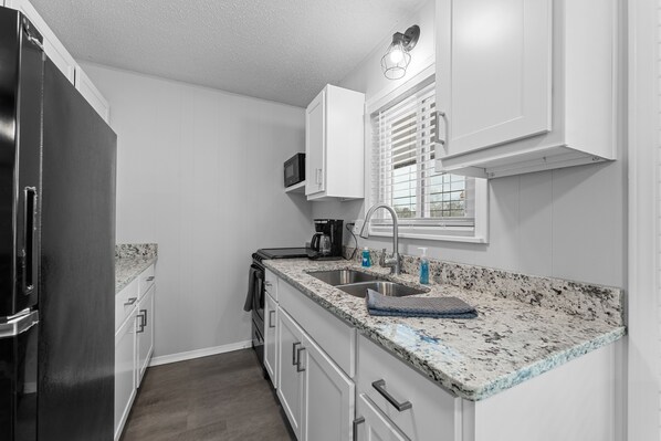 Condo, 2 Bedrooms | Private kitchen | Fridge, coffee/tea maker