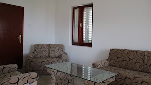 Apartment, 1 Schlafzimmer, Raucher, Balkon | Wohnzimmer