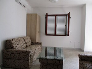 Apartment, 1 Bedroom, Smoking, Balcony | Living room - Charming 3-bed Apartment in Budva With Garden and Ocean Views (Budva)