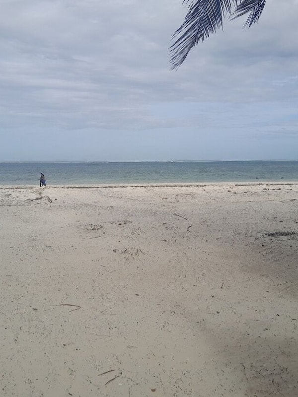 On the beach, white sand