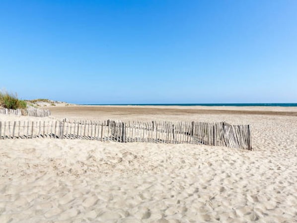 Enjoy a serene beach experience with access to the ocean.