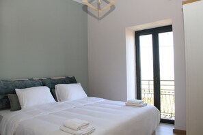 2 habitaciones y ropa de cama