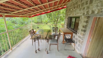 Premier Quadruple Room, Hill View | Terrace/patio