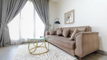 Economy Apartment, 1 Bedroom, Non Smoking | Living area | Flat-screen TV