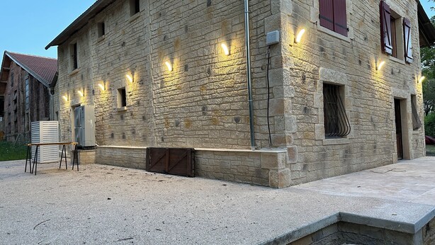 A stone building with a gravel courtyard, outdoor seating, and a small planter. - House by the river. Near Sarlat, Beynac, La Roque Gageac (Vézac)