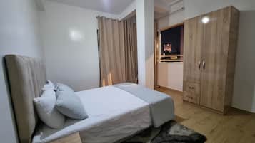2 slaapkamers, een kluis op de kamer, een strijkplank/strijkijzer