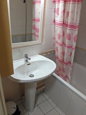 Shower, towels, toilet paper