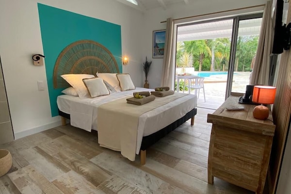 Comfort Room, Pool View | Individually decorated, individually furnished, free WiFi