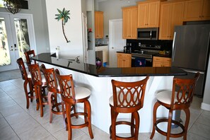 Fridge, microwave, oven, stovetop - Villa Pelican Point with gulf access by SWFL-Villas in Southwest Cape Coral (Cape Coral)