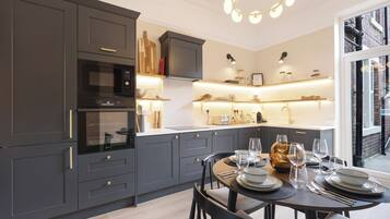 Apartment, Patio | Private kitchen | Coffee/tea maker, electric kettle, toaster