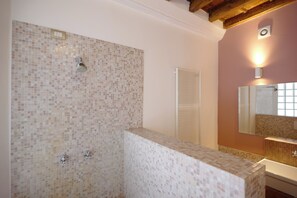 Bidet, towels, soap, toilet paper