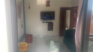 Unclassified image, 4 of 22, button - Furnished and air-conditioned 2-bedroom apartment living room (Dakar)
