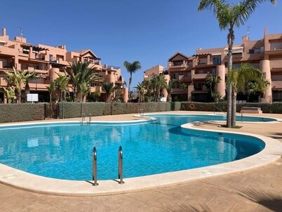 Golf paradisse  Charming 2-bedroom apartment with AC, WiFi in delightful MC