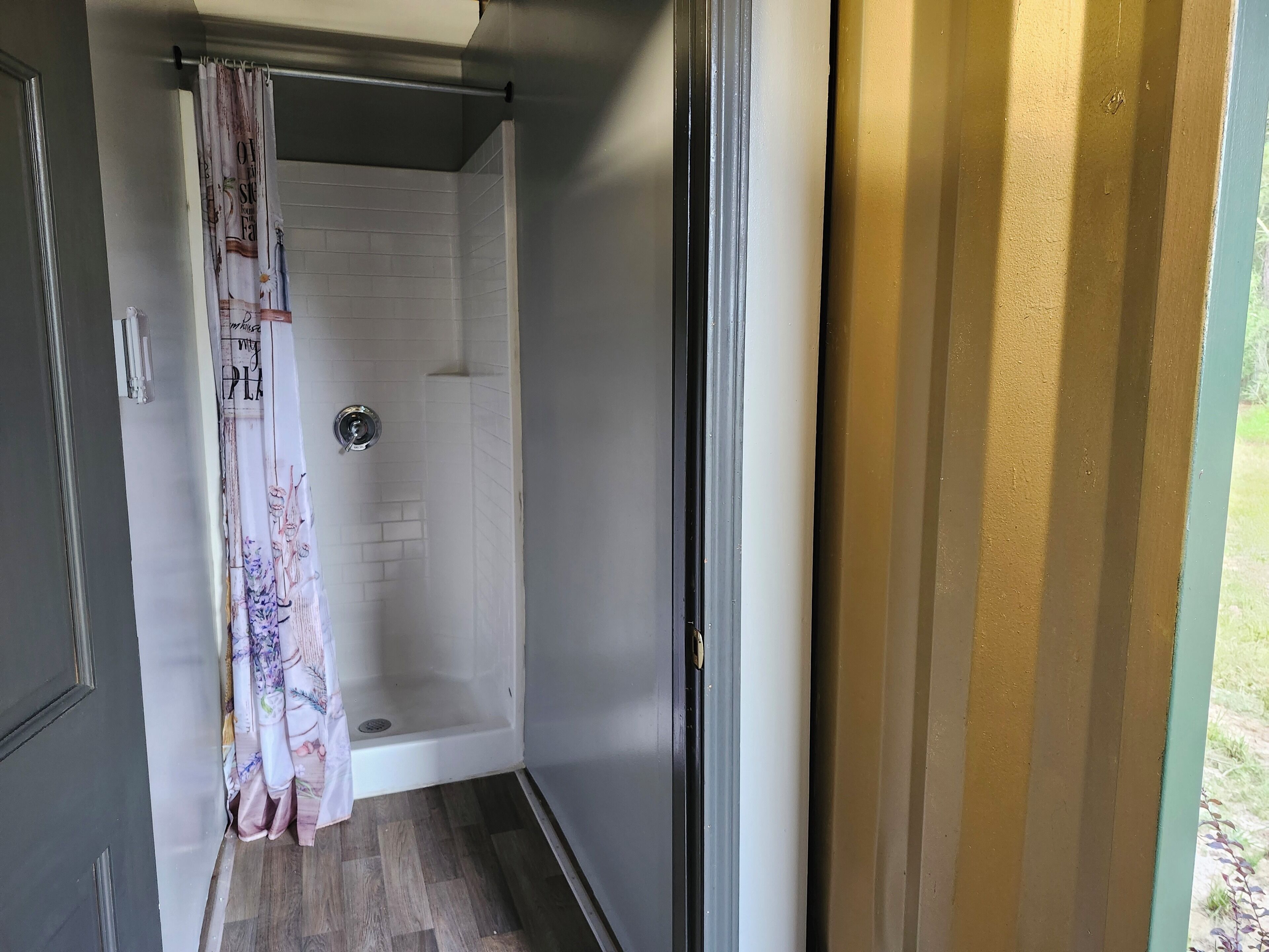 Shower, towels, soap, toilet paper