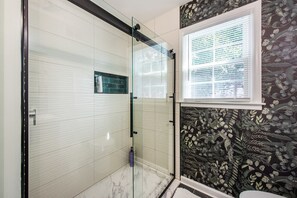 Shower, towels, soap, toilet paper