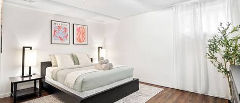 1 bedroom, desk, iron/ironing board, travel crib