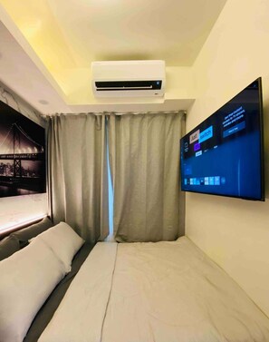 1 chambre, fer et planche à repasser, accès au Wi-Fi (inclus)