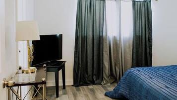 2 habitaciones, tabla de planchar con plancha, wifi y ropa de cama