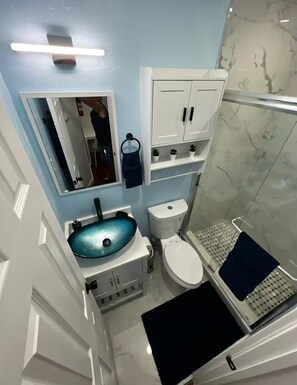Hair dryer, towels, soap, toilet paper
