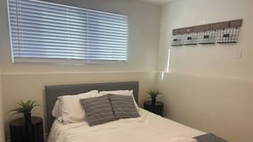 2 habitaciones, tabla de planchar con plancha, wifi y ropa de cama