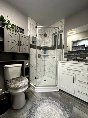Shower, hair dryer, towels, soap
