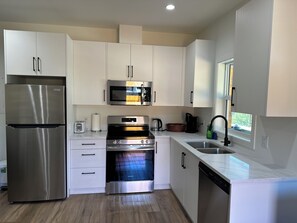 Fridge, microwave, oven, stovetop - Whispering Trees a quiet home in a forested area of Langford. (Victoria)