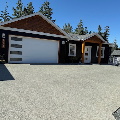 Whispering Trees a quiet home in a forested area of Langford. 