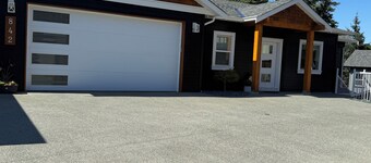 Whispering Trees a quiet home in a forested area of Langford. 
