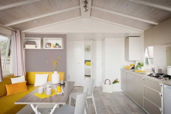 Fridge, microwave, stovetop, cookware/dishes/utensils