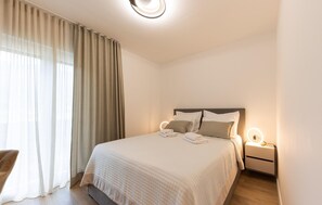 2 slaapkamers, een kluis op de kamer, reisbedje, gratis wifi