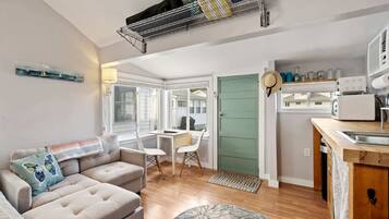 Studio Suite, 1 Queen Bed, Kitchen, Garden View (Just Beachy) | Living area | 34-inch flat-screen TV with digital channels