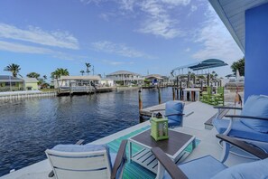 Terrace/patio - New!  Hidden- Speakeasy-penny floor. 3bd 3bath Boat dock & Walk 2 town FABULOUS (Matlacha)