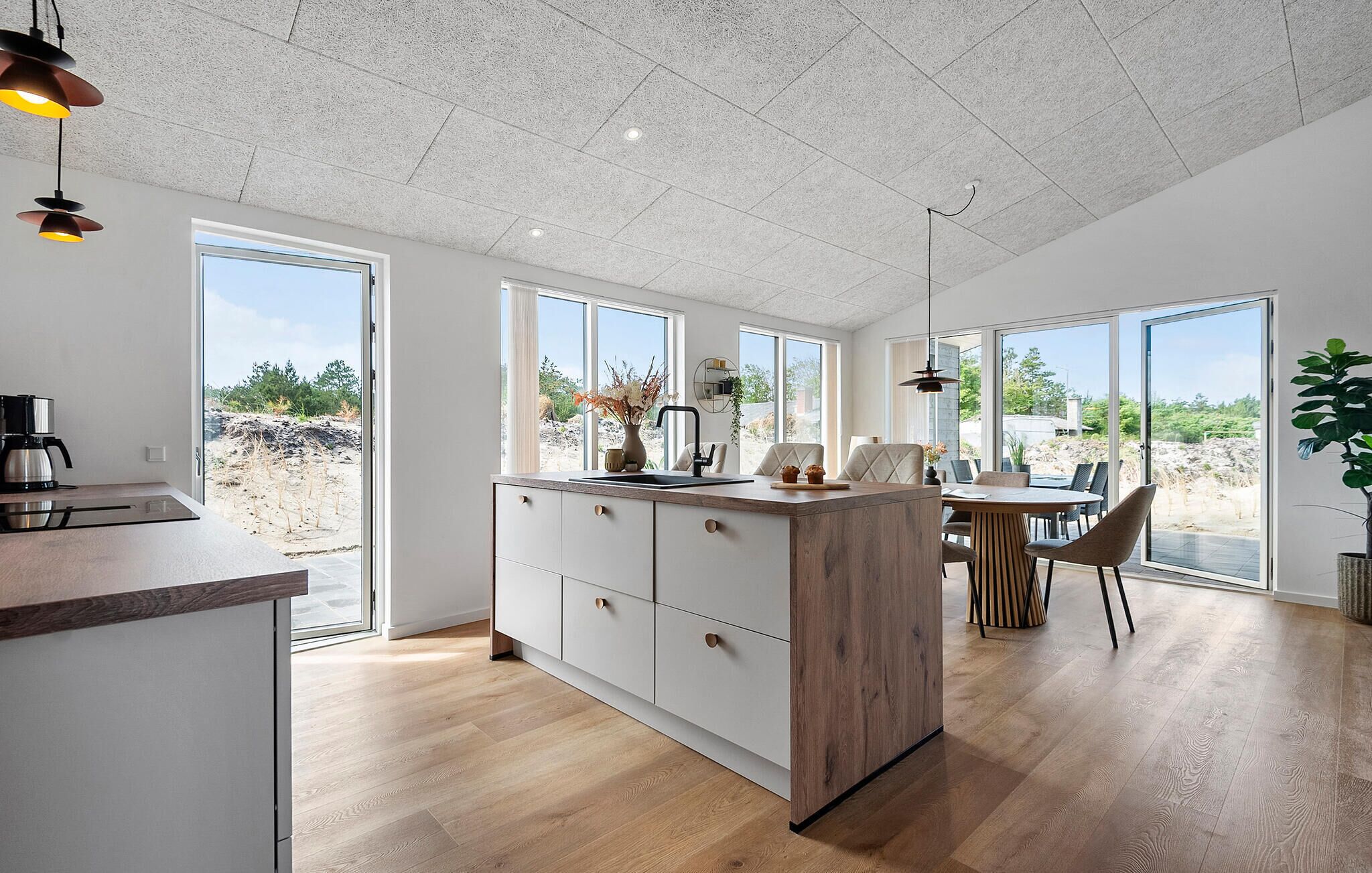 Fridge, stovetop, dishwasher, coffee/tea maker