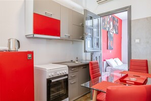 Fridge, oven, electric kettle, cookware/dishes/utensils
