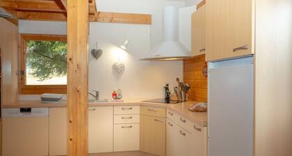 Chalet '331 - Village Nordique' avec vue sur la montagne, piscine partagée et terrasse privée