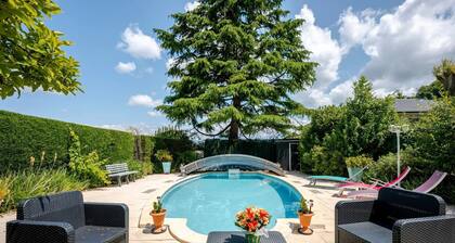 Maison d'hÎtes 'Chambres D'hotes PrÚs Lac Annecy 1' avec piscine partagée et jardin partagé
