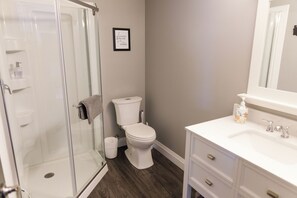 Shower, towels, soap, toilet paper