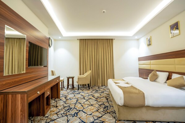 Deluxe Double or Twin Room, Mountain View | 1 bedroom, in-room safe, blackout drapes, iron/ironing board