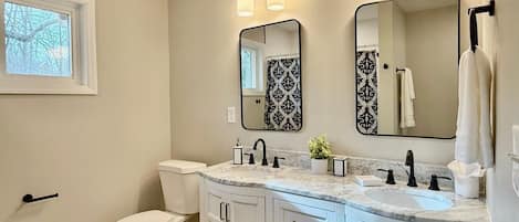 Shower, towels, soap, toilet paper