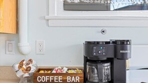 A coffee maker and a coffee bar on a kitchen counter. - 4BR Home w/ Rooftop Deck - 3 Block to Beach (Ventnor City)