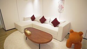 Maison mobile Signature, 1 très grand lit et 1 canapé-lit | Aire de séjour